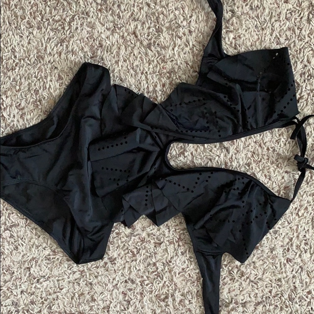 Black one piece swim suit never worn